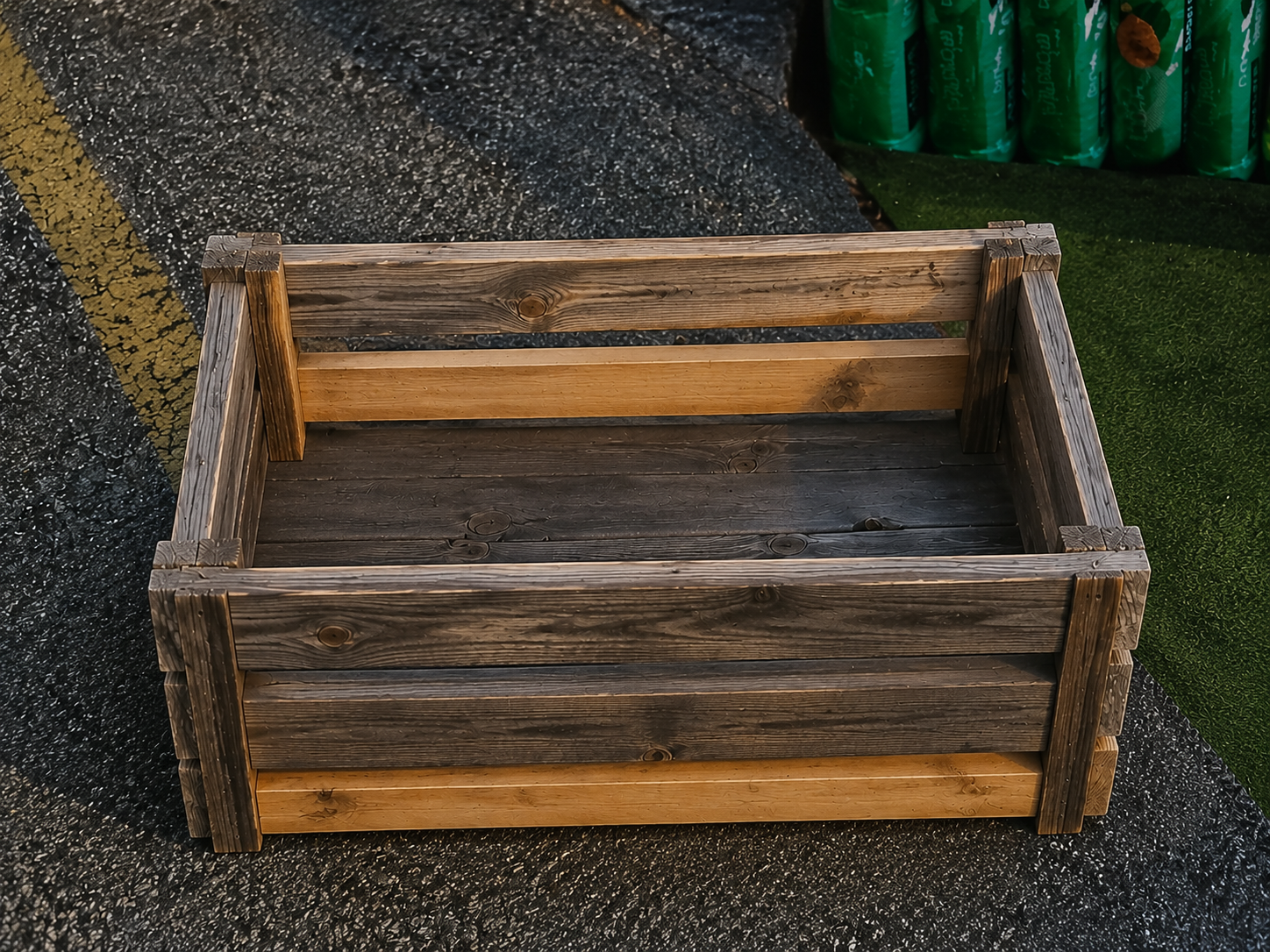 Custom-built wood planter boxes by The Lawn Guy